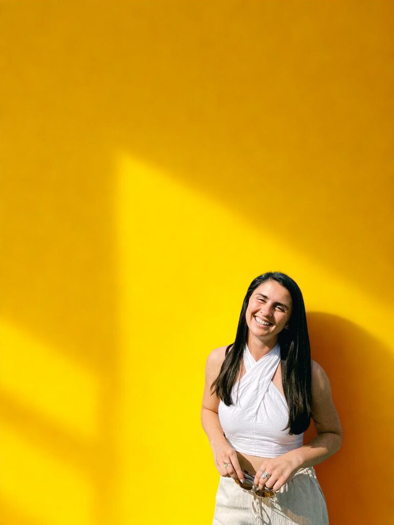 Portrait against a sunlit wall in Madrid